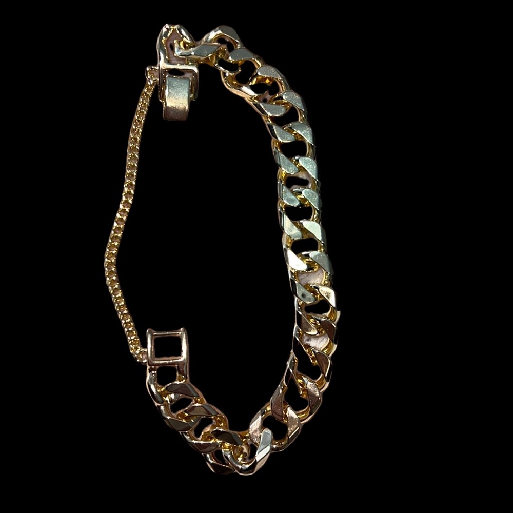 Gold toned stainless steel, Cuban link style bracelet